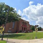 On October 17, 2022, at approximately 3:20 p.m., officers responded for a citizen's report of a male with a handgun walking in the area of Glen Burnie High School with another male.