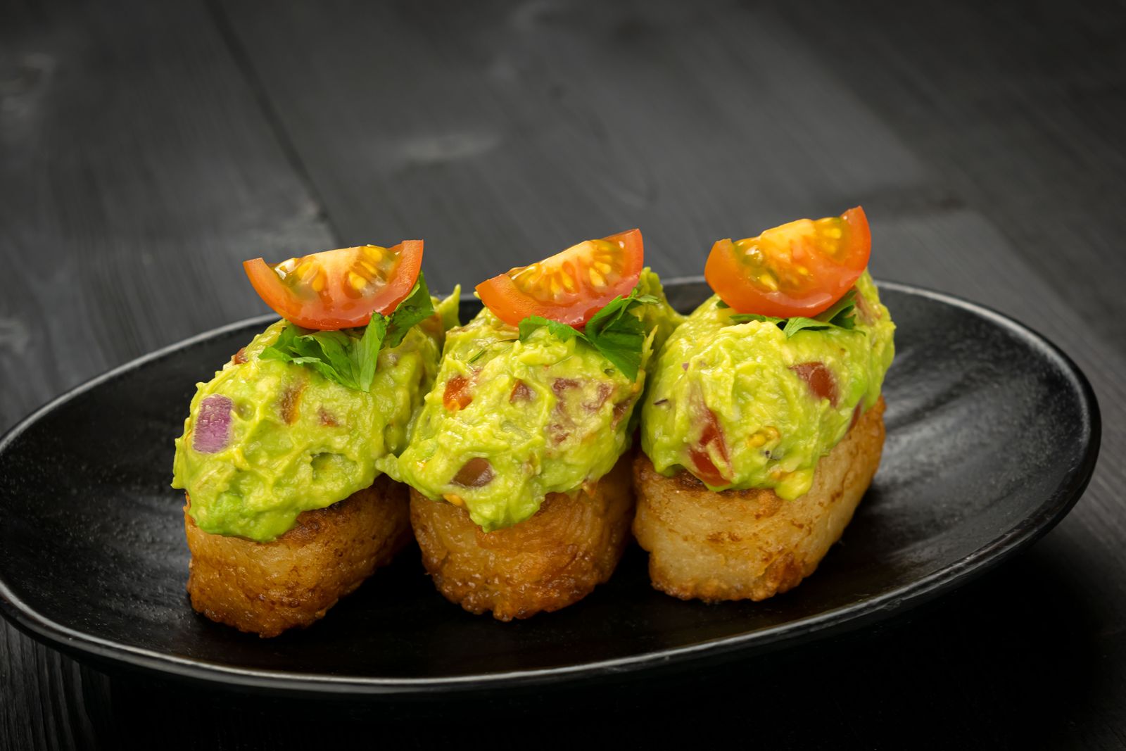 JINYA Ramen Bar Vegan Crispy Rice with Guacamole JINYA Ramen Bar Launches Bold New Vegan and Vegetarian Dishes