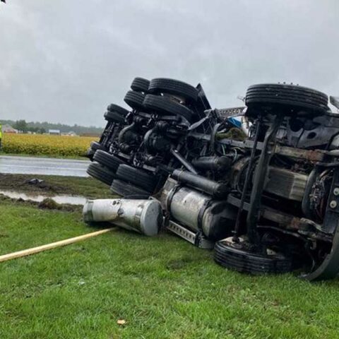 Lumber truck overturned in bridgeville crash - photo licensed by shore news network.