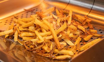 MOOYAH Celebrates National French Fry Day with Big Idaho Potato Hotel Partnership