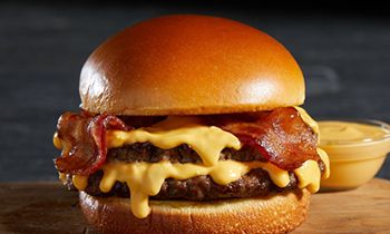 Nathan’s Famous Launches New Bacon Cheddar Cheesy Burger in Celebration of National Cheeseburger Day