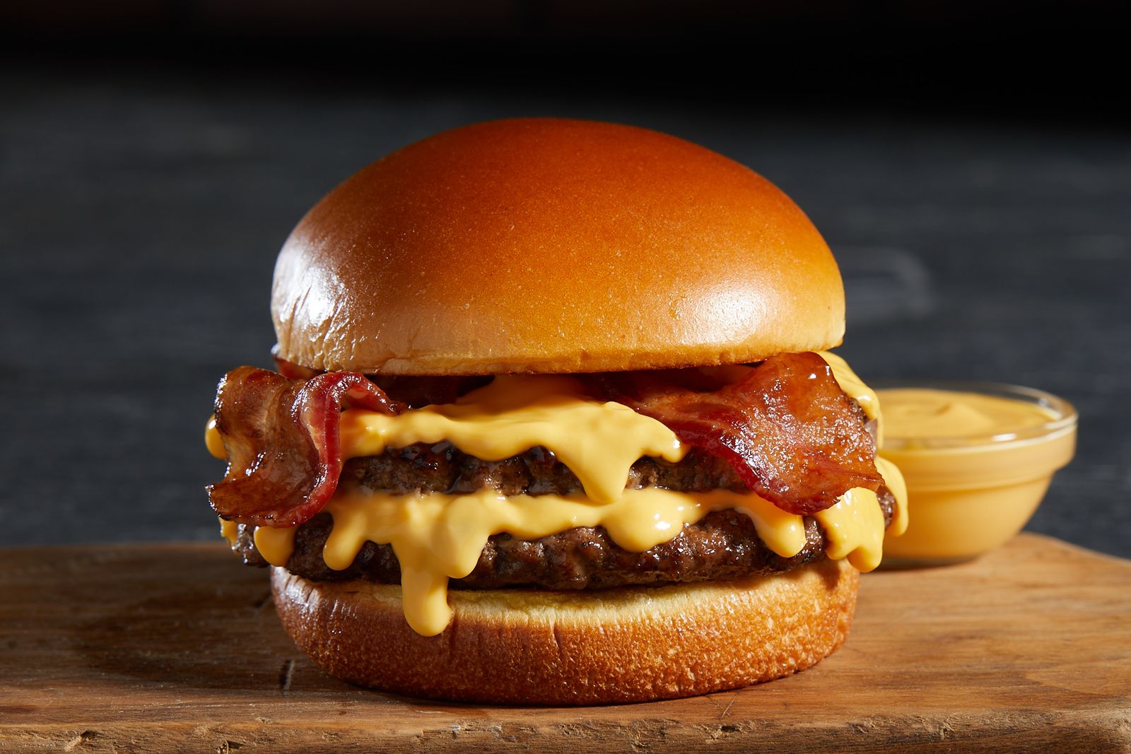 Nathan's Famous Cheddar Cheesy Burger Nathan's Famous Launches New Bacon Cheddar Cheesy Burger in Celebration of National Cheeseburger Day