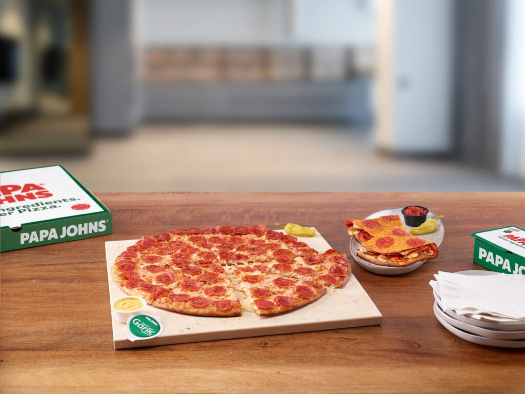 Papa Johns Celebrates the Return of Shaq-a-Roni Pizza, Highlighting its Footprint in a Big Way