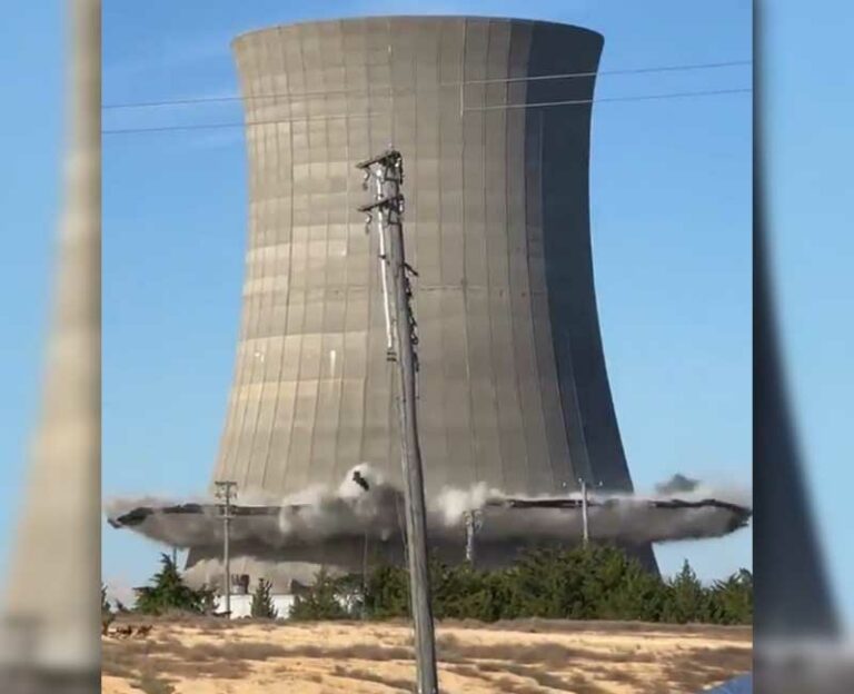 Iconic new jersey power plant cooling tower goes down - photo licensed by shore news network.