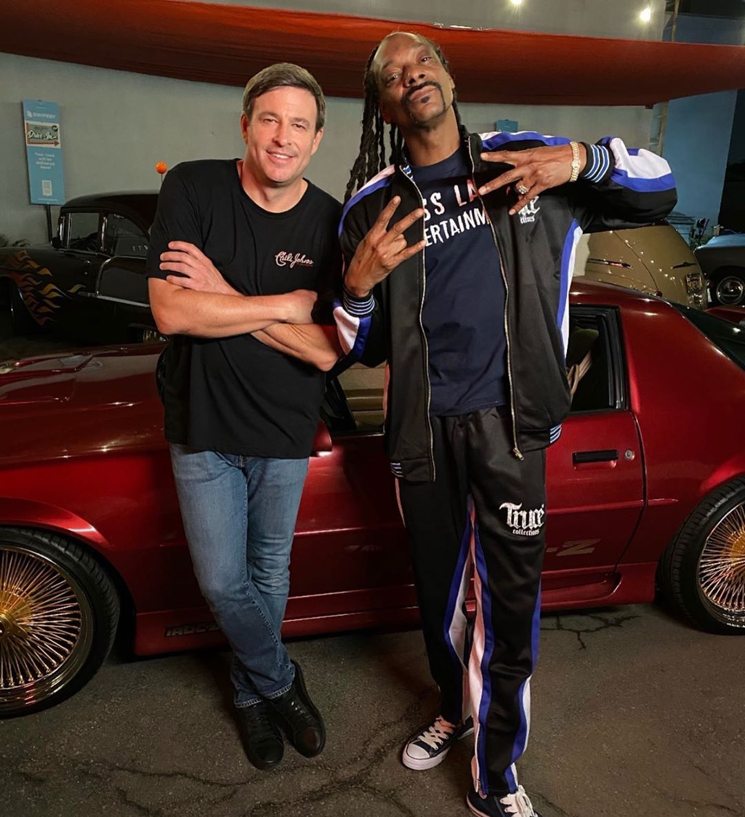 Todd Graves with Snoop Dogg. Raising Cane's Founder and Celebrity Friends Help Save Family-owned Restaurants on new discovery+ Series, Restaurant Recovery