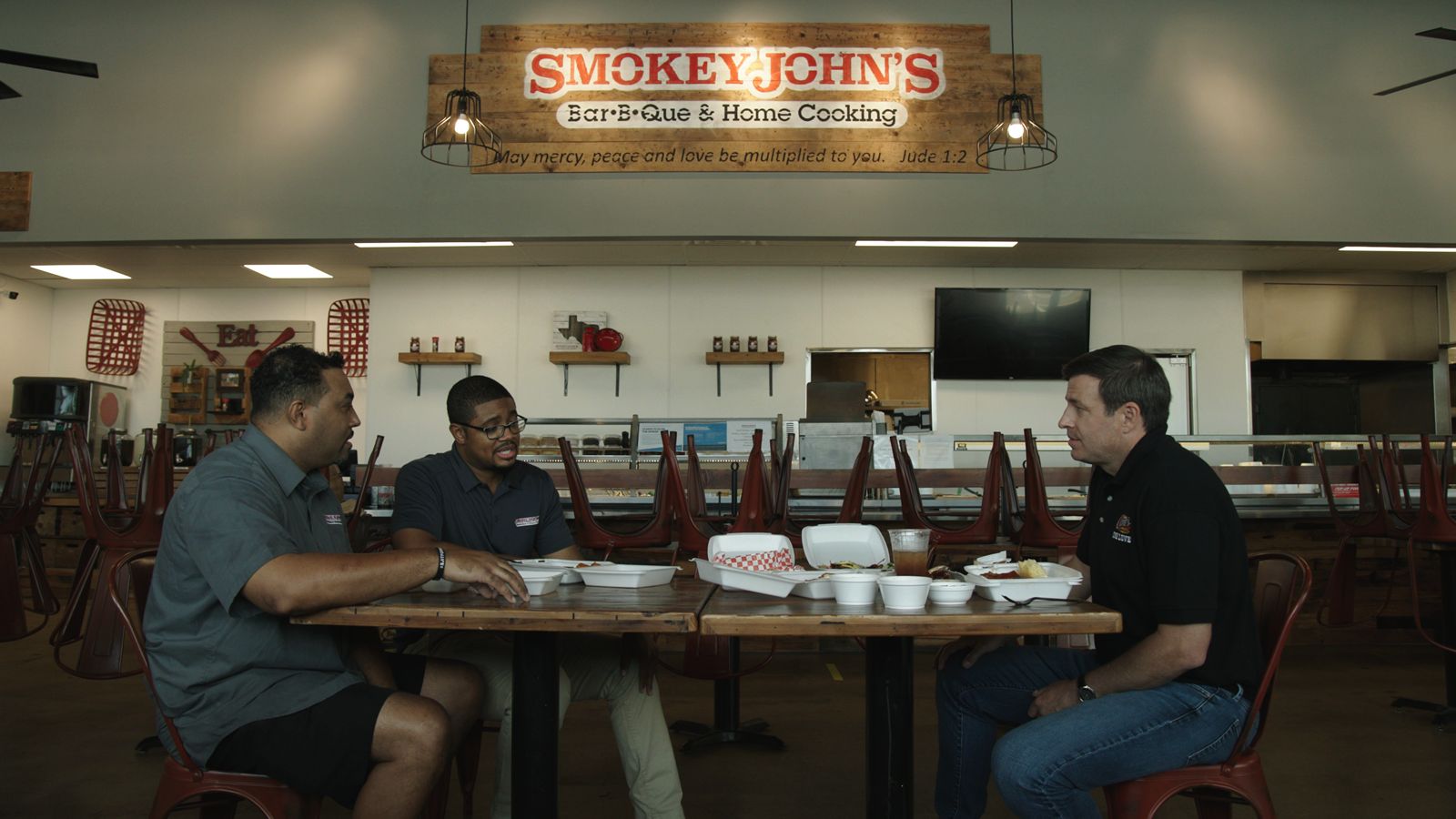 Todd Graves with Smokey John's owners Juan and Brent Reaves. Raising Cane's Founder and Celebrity Friends Help Save Family-owned Restaurants on new discovery+ Series, Restaurant Recovery