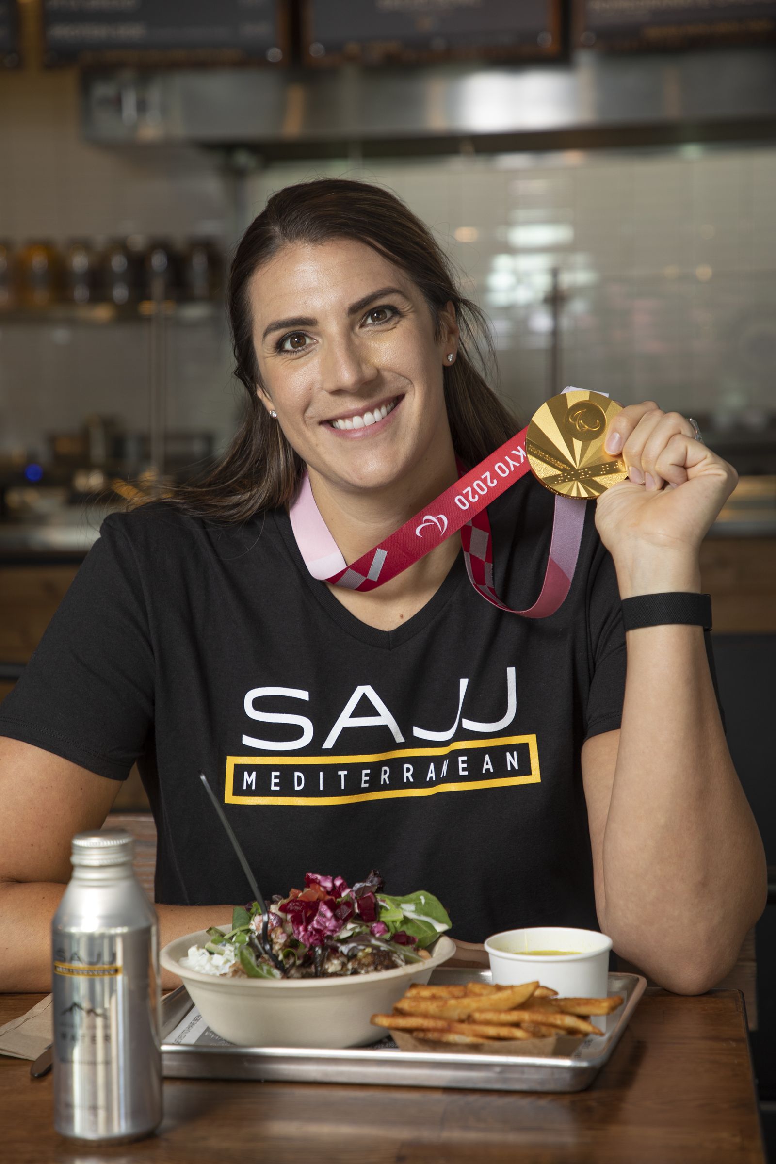 Katie Holloway has been an avid SAJJ Mediterranean fan for several years due to its healthy and sustainable menu, and her go-to order is the Steak Shawarma Freekeh Bowl with sumac cauliflower, eggplant ragout, garbanzo beans, tzatziki, mixed greens, tomato cucumber, diced beets and tahini sauce. SAJJ Mediterranean Aces Partnership With USA Paralympic MVP and Gold Medalist Katie Holloway