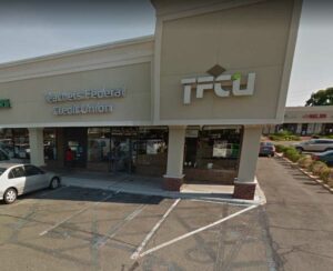 Male bank robber dressed as woman sought on long island