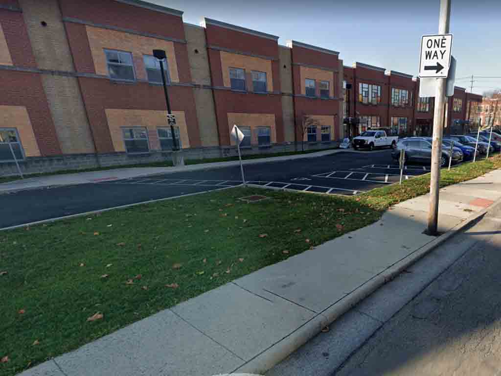 Woman charged after bringing a gun to Columbus Elementary School