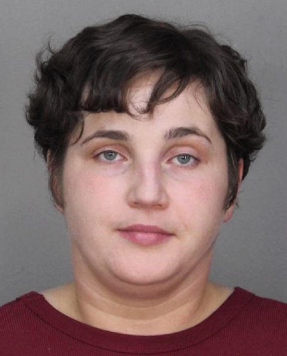Woman arrested for October baseball bat assault