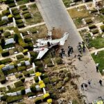 SCPD officers as well as members of the East Farmingdale Fire Department responded to a plane crash at the Beth Moses Cemetery in West Babylon on Saturday afternoon. Photo provided by SCPD.