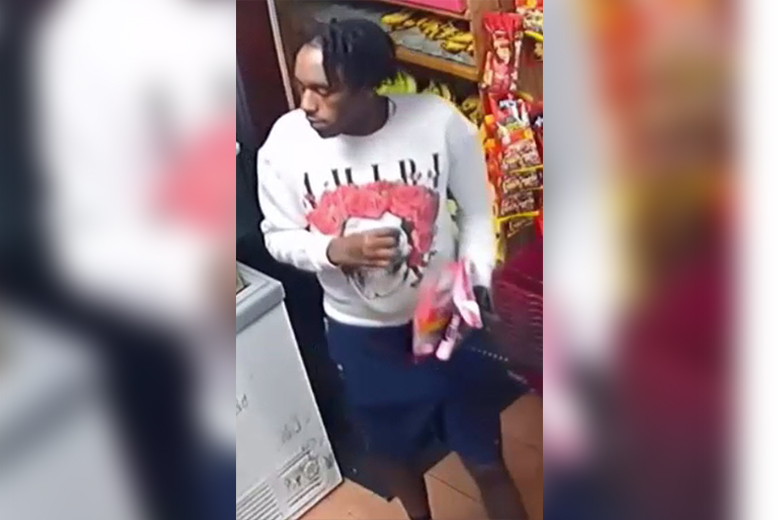 Police seeking masked suspect who assaulted and robbed two outside Philadelphia market