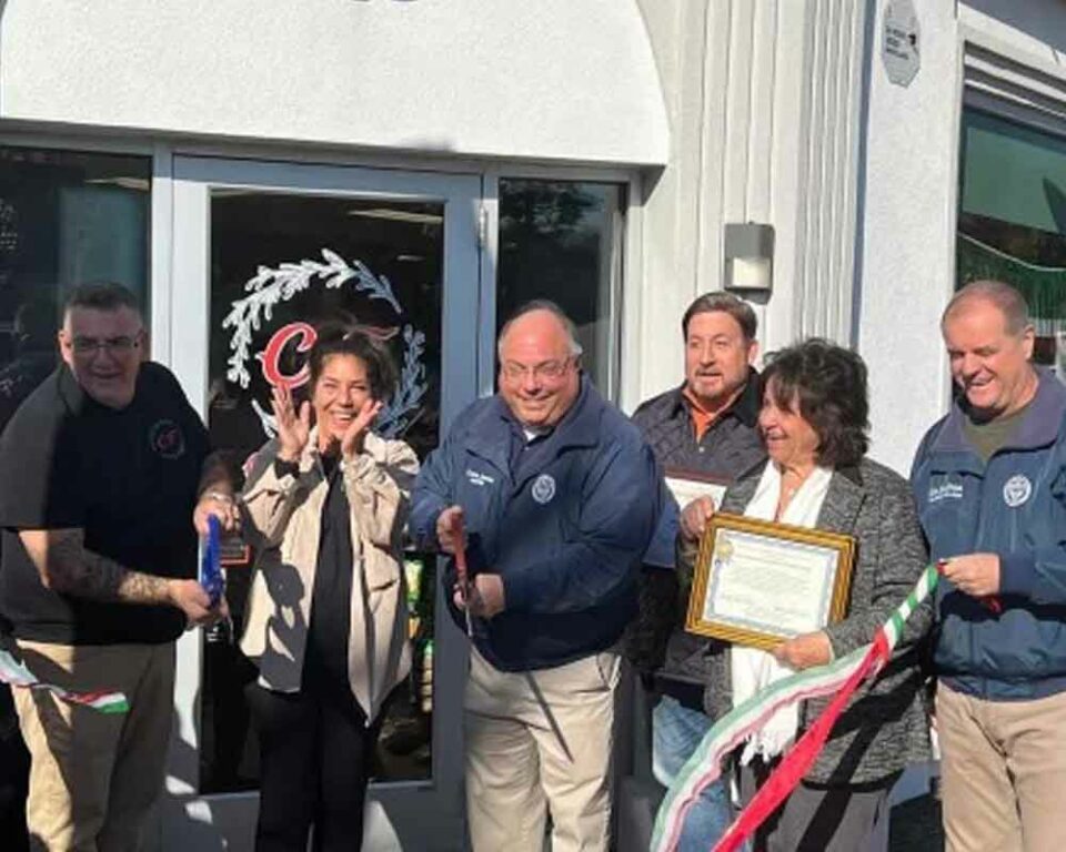 Mayor Carmen Amato joins township officials for the grand opening of Cucina Fresca.