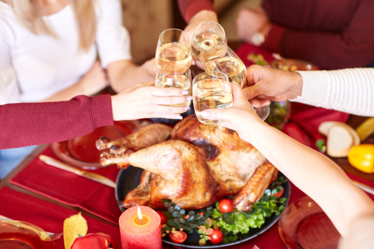 Celebrating thanksgiving with drinks.