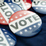 Vote pin - Stock Photo