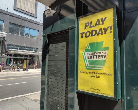 Sign advertising the Pennsylvania Lottery. This photo was taken in Center City, Philadelphia, Pennsylvania, on August 18th 2022.