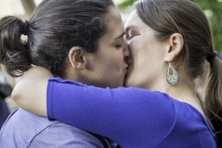 MADISON, WISCONSIN USA - JUNE 6: A lesbian couple getting married on the steps of the City County Building after a judge struck down Wisconsin s gay marriage ban on Friday June 6, 2014 in Madison, WI
