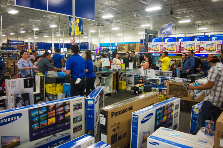 People shopping in a Best Buy store during Black Frida