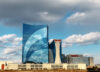 Atlantic city, nj, december 10, 2016: the harrah`s hotel and casino is seen under blue sky with clouds.