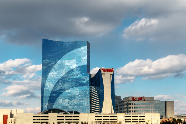 Atlantic City, NJ, December 10, 2016: The Harrah`s hotel and casino is seen under blue sky with clouds.