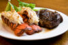 Juicy grade aaa angus new york strip sirloin steak with lobster tails