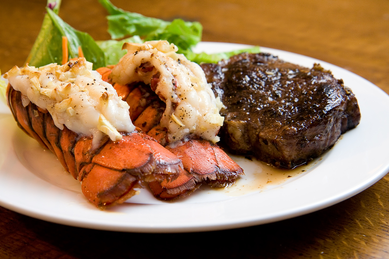 Juicy Grade AAA Angus New York Strip sirloin steak with Lobster Tails