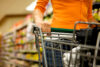 A woman shopping in a supermarket for groceries