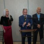 Jackson Township Mayor Michael Reina speaks before supporters alongside Councilwoman-elect Jennifer Kuhn and Councilman-elect Scott Sargent.