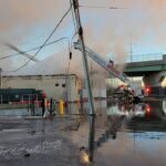 Firefighters battling a 3-alarm fire at a food preparation company near the corner of E. Elizabeth & N. Park Ave. Photo provided by Linden Police Dept.