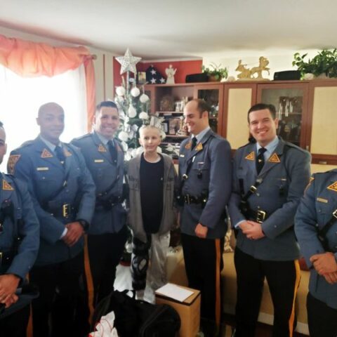 State police visit boy with cancer, bearing holiday gifts - photo licensed by shore news network.