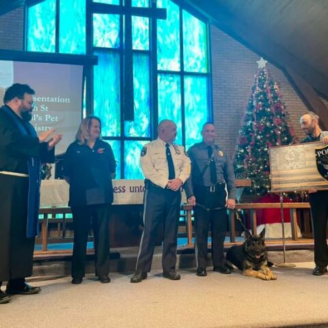 Paul's united methodist church presents $2500 check to brick police dept.