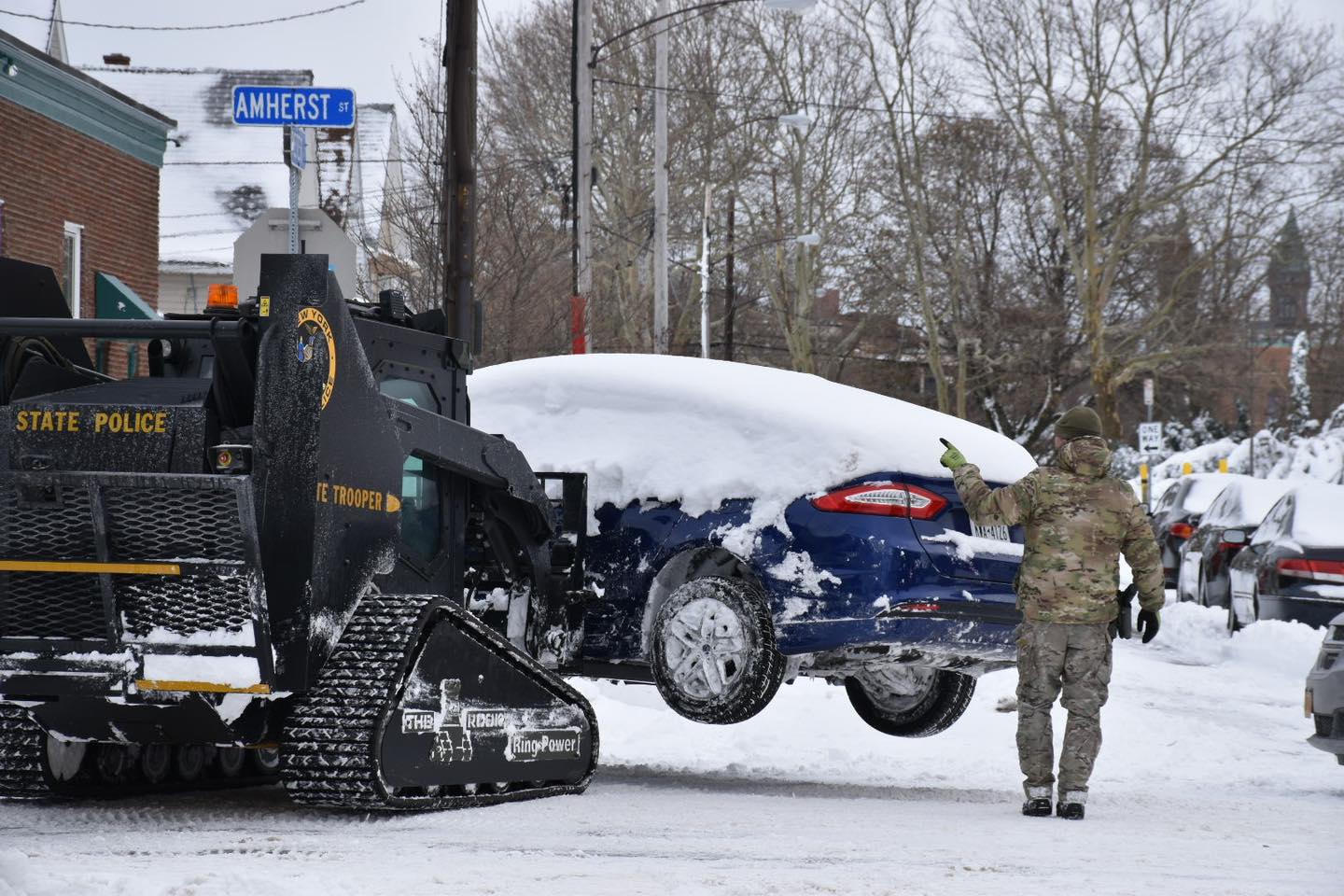 he ROOK removing vehicles from the roadways in Buffalo, so the streets can be plowed! - Photo by NYSP