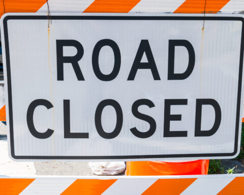 Road closed sign.
