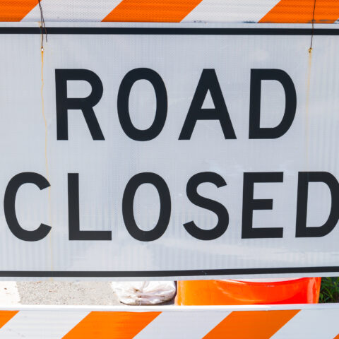 Road closed sign.