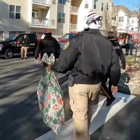Absecon police, firefighters deliver toys to children - photo licensed by shore news network.