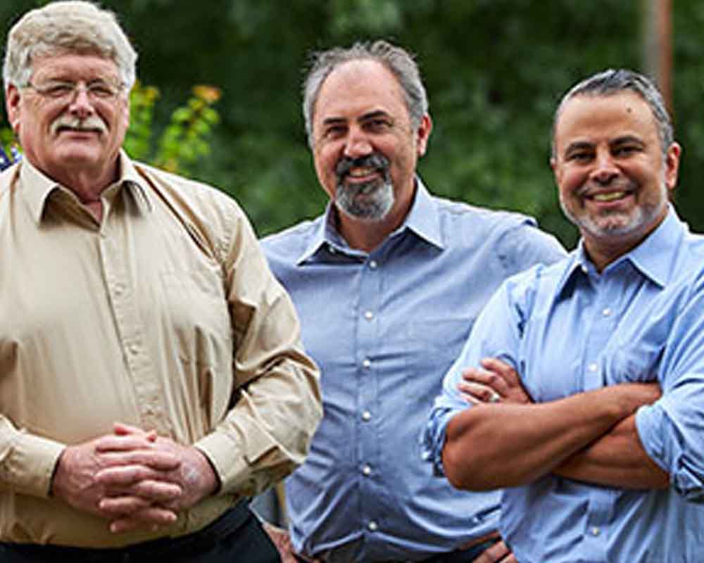 Campaign photo showing Steven Chisolm (CENTER)