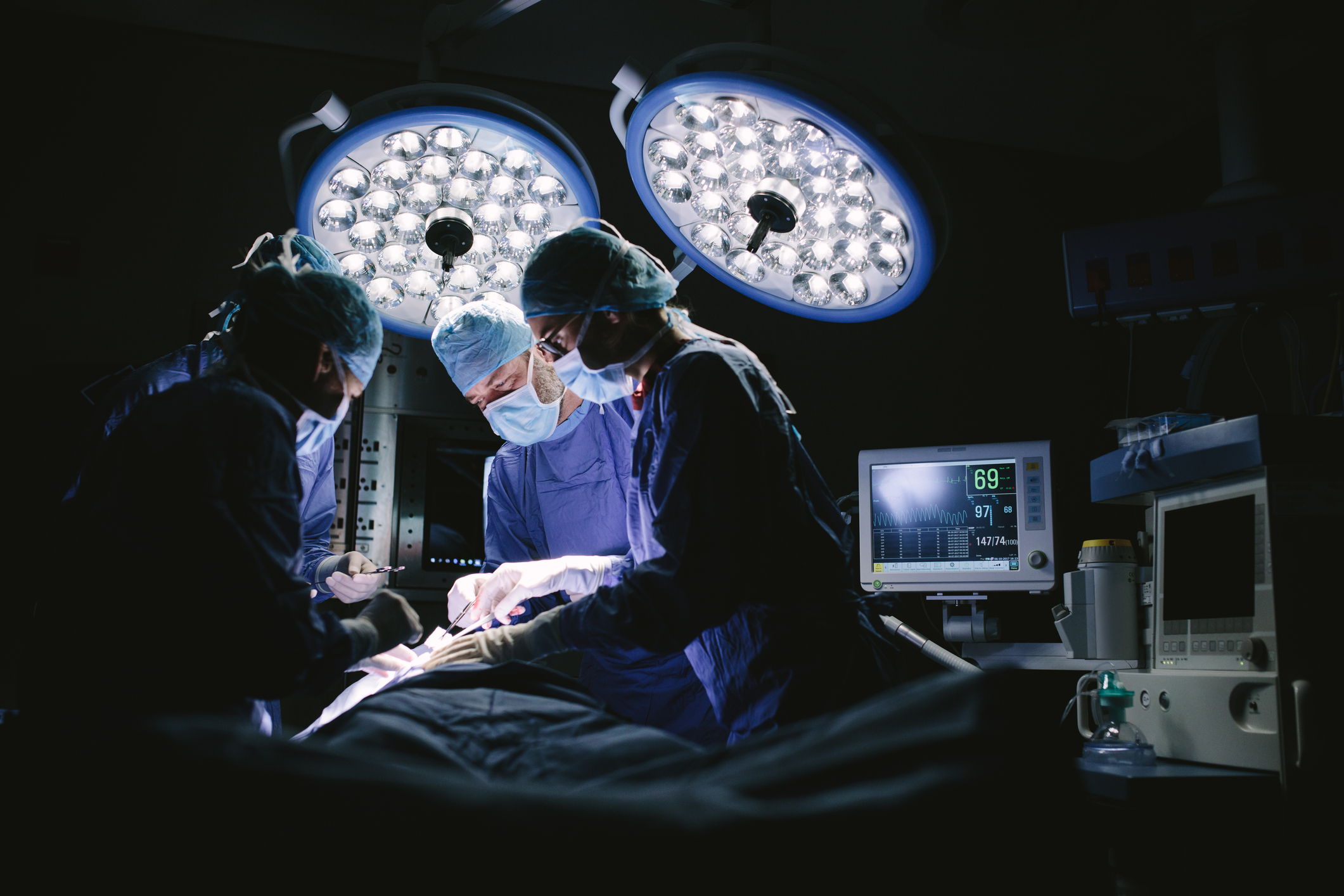 Doctors performing surgery.