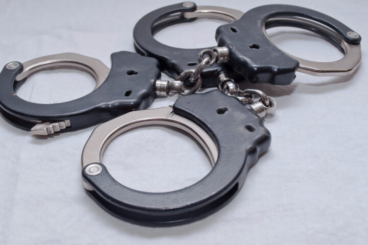 Two sets of handcuffs.