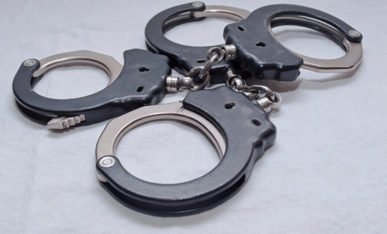 Two sets of handcuffs.