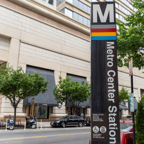 Washington dc -sign for the entrance to the metro center station,
