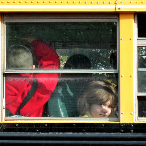 Children on a public school bus.