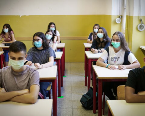 Students wearing face masks - file photo.