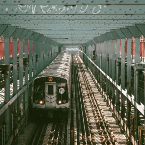 Subway train crossing the williamsburg bridge, in new york city