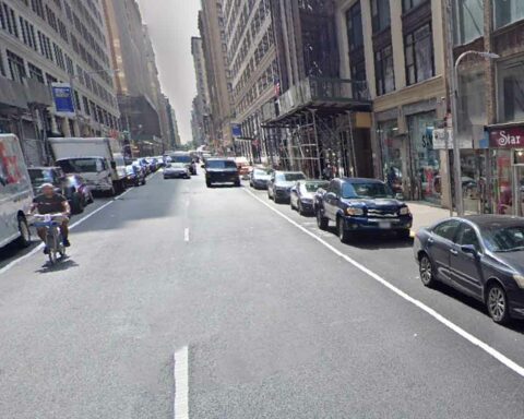 A female drug dealer and her boyfriend were reportedly selling drugs from a table outside 235 West 37th Street when they were confronted by a rival group of drug dealers.