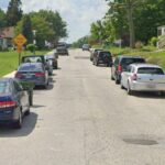 On December 10, 2022, at approximately 4:06 a.m., officers were dispatched to investigate calls for a car accident and shooting in the 3200 block of Rosalie Avenue.