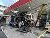 Big rig crashes into gas station causing roof collapse