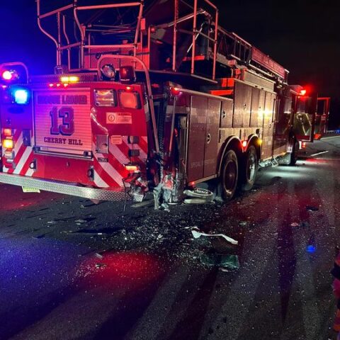 Fire truck struck while at call on interstate 295 - photo licensed by shore news network.
