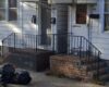 Trenton man charged after body found in trash bag