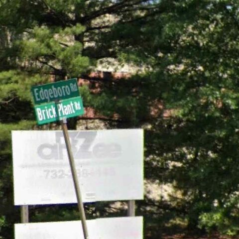 Crash into utility pole shuts down traffic on brick plant road - photo licensed by shore news network.