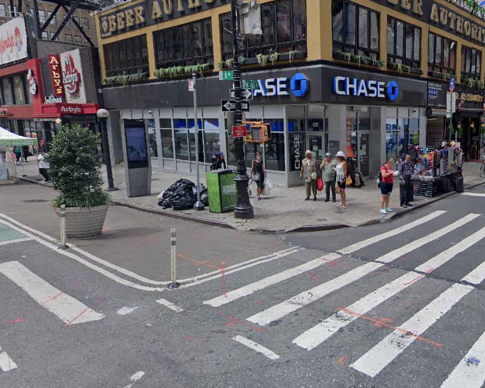 On Thursday, January 19, 2023 at approximately 0340 hours, police responded to a 911 call of a male assaulted inside of 615 8th Avenue (vestibule area of Chase Bank), within the confines of the Midtown South Precinct. Upon arrival, officers observed a 42-year-old male with burns to the right side of his face, neck, and shoulder.